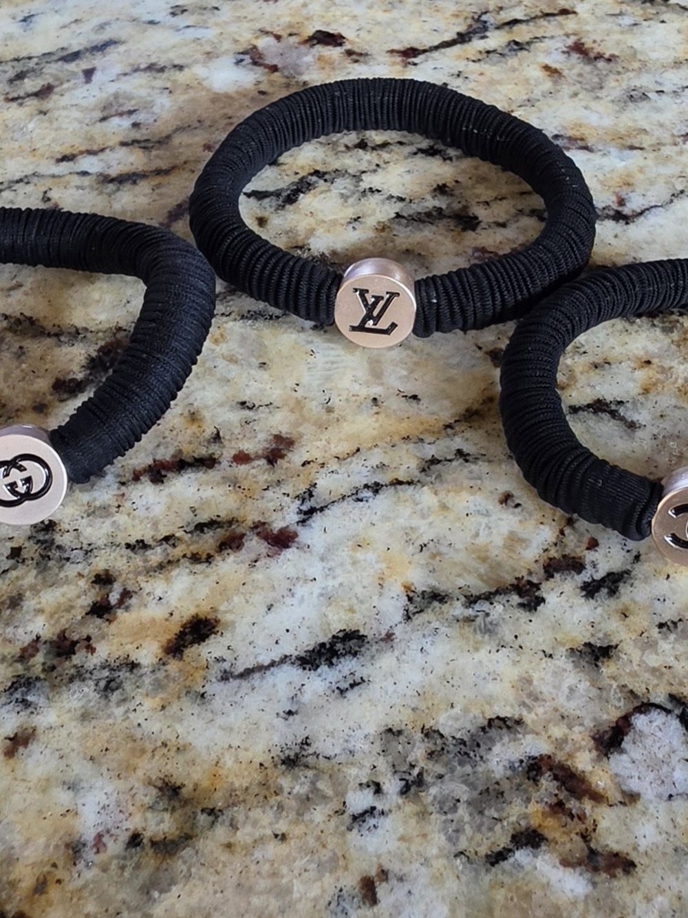 Black Elastic Hairtie with Logo Medallion